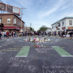 Flowers placed at the middle of 38th and Chicago in South Minneapolis.