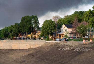 "I Can't Breath" painted on the dirt of Interstate 35W as the sun rises with heavy smoke still in the air from a night of fires in Minneapolis on May 30, 2020.