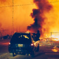 A 6-story new housing development on fire near the Minneapolis Police 3rd Precinct during the 2nd day of protests in Minneapolis following the death of George Floyd.