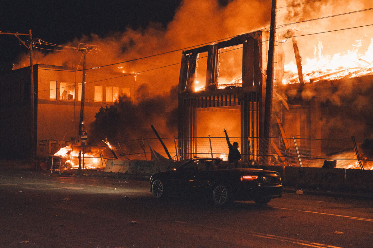 A 6-story new housing development on fire near the Minneapolis Police 3rd Precinct during the 2nd day of protests in Minneapolis following the death of George Floyd.