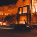 A 6-story new housing development on fire near the Minneapolis Police 3rd Precinct during the 2nd day of protests in Minneapolis following the death of George Floyd.