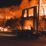 A 6-story new housing development on fire near the Minneapolis Police 3rd Precinct during the 2nd day of protests in Minneapolis following the death of George Floyd.