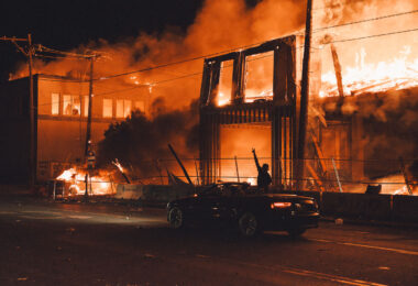 A 6-story new housing development on fire near the Minneapolis Police 3rd Precinct during the 2nd day of protests in Minneapolis following the death of George Floyd.