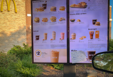 A McDonalds sign on 05/30/20 reading "Due to the recent activity in our city we will be closing at 6:30pm today & reopen tomorrow at 7am."