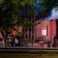 Minneapolis Fire Department fight a fire on May 30, 2020 at Speedway gas on Lake Street as the sun rises following the 4th day of protests in Minneapolis following the death of George Floyd.