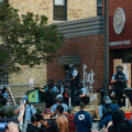 Protesters and Minneapolis police outside the third precinct on May 27th, 2020, the second day of protests following the death of George Floyd.