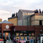Minneapolis police on the roof of the third precinct.