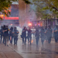 Minneapolis police continue to push protesters and media away from the third precinct.