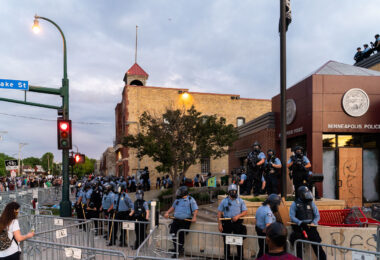 Minneapolis Police surround the 3rd Precinct during the 2nd day of protests in Minneapolis following the death of George Floyd.