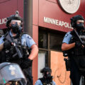 Minneapolis Police outside the 3rd Precinct as protesters gathered on the 2nd day of protests in Minneapolis following the death of George Floyd.