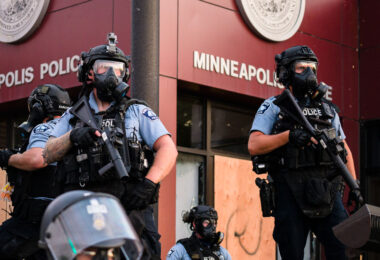Minneapolis Police outside the 3rd Precinct as protesters gathered on the 2nd day of protests in Minneapolis following the death of George Floyd.