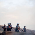 Officers on the roof of the third precinct with "less lethal" weapons.