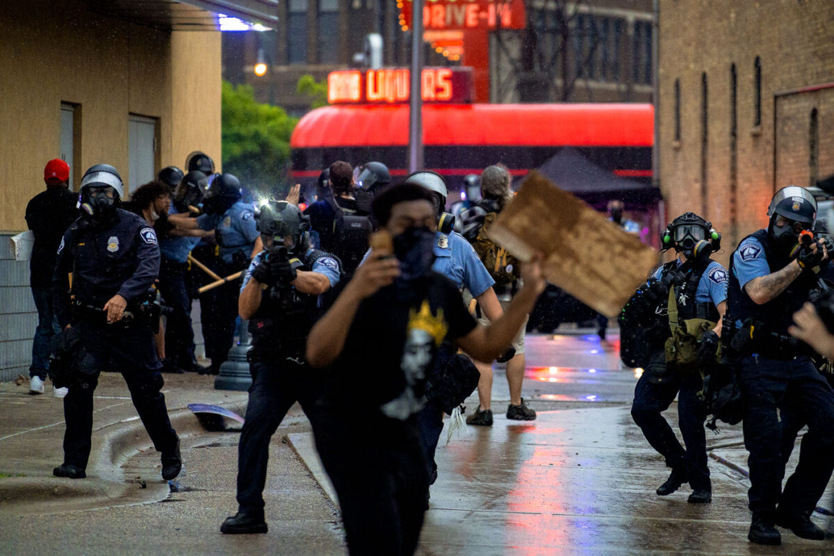 Minneapolis Police clear protesters out from around the third precinct police station using less lethal weapons. 

Protesters had gathered after the death of George Floyd the night before, this was day 1 of protests.