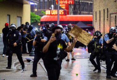 Minneapolis Police clear protesters out from around the third precinct police station using less lethal weapons. 

Protesters had gathered after the death of George Floyd the night before, this was day 1 of protests.