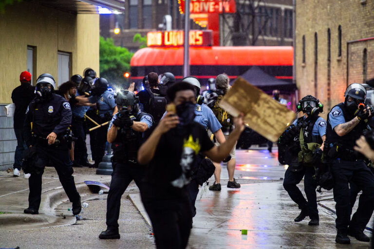 Minneapolis Police fire at protesters 1 Minneapolis Police clear protesters out from around the third precinct police station using less lethal weapons. Protesters had gathered after the death of George Floyd the night before, this was day 1 of protests.