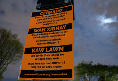Park closed due to coronavirus signage at Elliot Park in Minneapolis.
