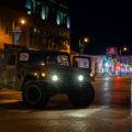 The Minnesota National Guard on Lake Street on May 30, 2020 while Minneapolis Fire Department puts out nearby fires on the 4th day of protests in Minneapolis following the death of George Floyd.