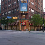 A biker bikes down N 7th St on May 28, 2020  in front of a boarded up O'Donovan's Irish Pub in Downtown Minneapolis on the 3rd day of protests in Minneapolis following the death of George Floyd.