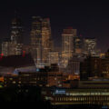 An orange moon over Downtown Minneapolis during a night of fires on the 4th day of protests in Minneapolis following the death of George Floyd.