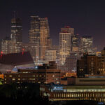 An orange moon over Downtown Minneapolis during a night of fires on the 4th day of protests in Minneapolis following the death of George Floyd.
