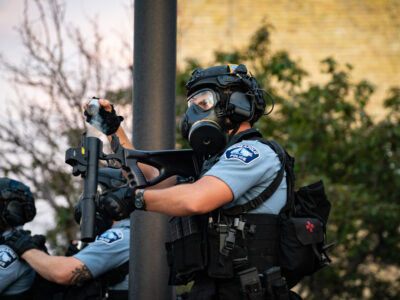 Officer Reloads Less Lethal Weapon at Minneapolis 3rd Precinct