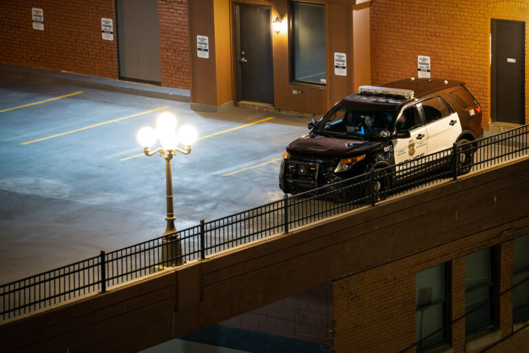 Police officers inside a squad car in North Loop 2 A Minneapolis Police squad car sits in a parking ramp in Minneapolis.
