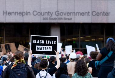 A protester holds up a sign reading "Black Lives Matter" outside the Hennepin County Government Center on May 28, 2020.