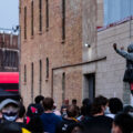 A protester stands on top of a Minneapolis Police squad car outside the 3rd Precinct. The large crowd marched from 38th Street and Chicago Ave the day after George Floyd was killed.