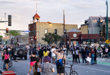 Minneapolis Police surround the 3rd Precinct as protesters continue to gather. The protests followed after the death of George Floyd days earlier.