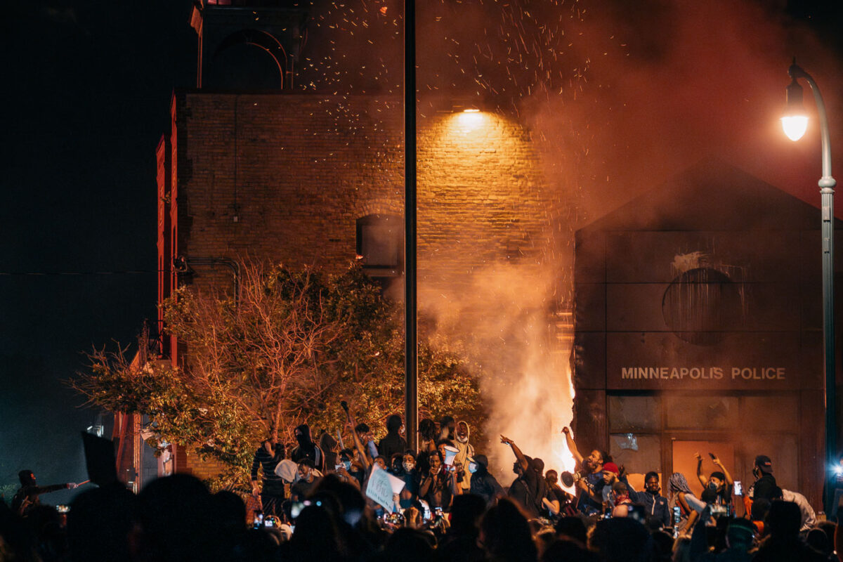 The Minneapolis Police 3rd Precinct on fire as protesters surround it after days of protest. 

The precinct was Derek Chauvin’s home precinct and was set ablaze after the police abandoned the precinct following days of protests over the death of George Floyd.