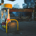 A car drives by a Shell gas station on Lake Street in Minneapolis on the morning of May 30, 2020 after nights of fires in Minneapolis.