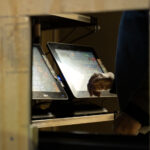 McDonald’s on Hennepin Ave in Uptown Minneapolis still serving through a small hole in a board.