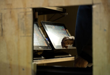 McDonald’s on Hennepin Ave in Uptown Minneapolis still serving through a small hole in a board.