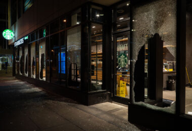 A Starbucks Store is looted in downtown Minneapolis on May 29, 2020 during the 3rd day of protests in Minneapolis following the death of George Floyd.