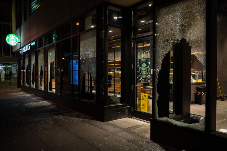 Starbucks in Downtown Minneapolis 4 A Starbucks Store is looted in downtown Minneapolis on May 29, 2020 during the 3rd day of protests in Minneapolis following the death of George Floyd.