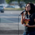 Sunsara Taylor speaks on behalf of The Revolutionary Communist Party outside the third precinct.