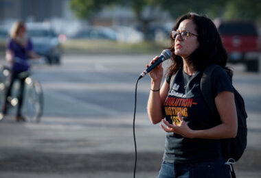 Sunsara Taylor speaks on behalf of The Revolutionary Communist Party outside the third precinct.