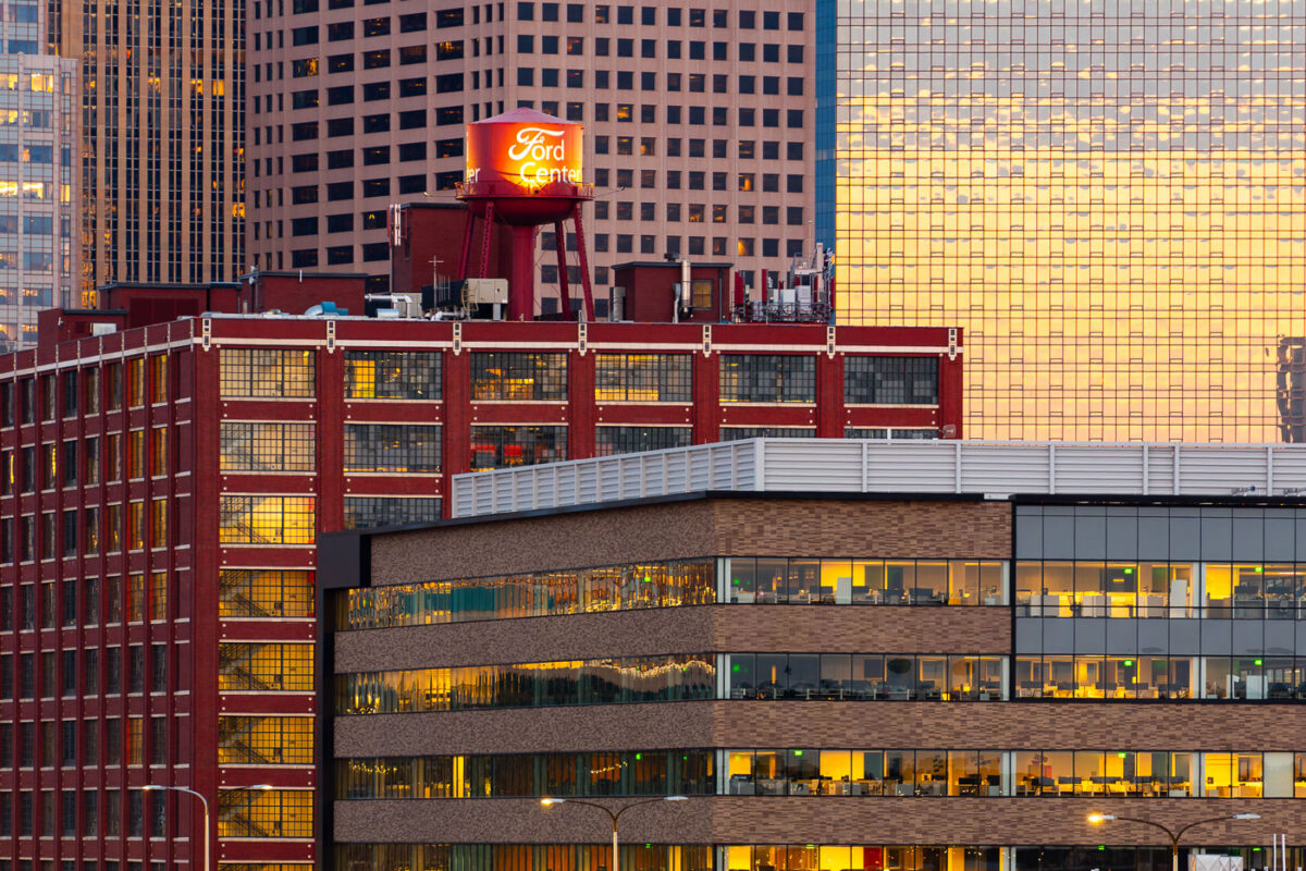 Sun sets in front of Ford Center in Minneapolis