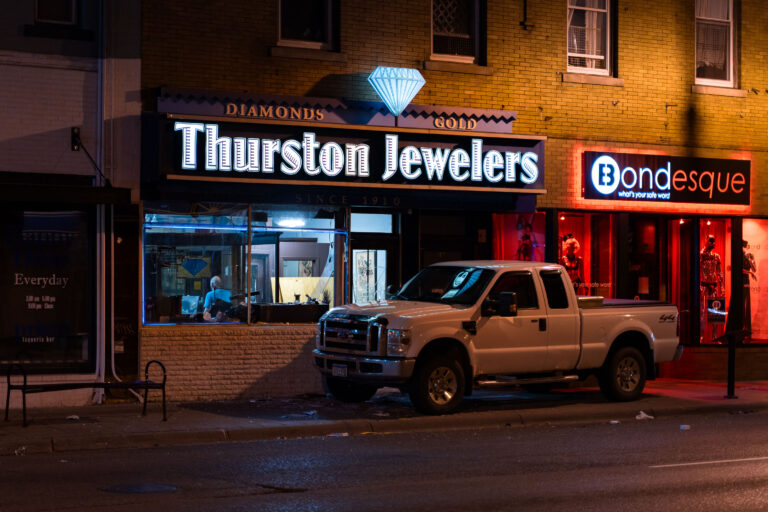 Thurston Jewelers, Bondesque during Minneapolis riots 3 Thurston Jewelers and Bondesque storefronts in Minneapolis at night after looting.