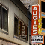Augies and The Famous Brass Rail signs in downtown Minneapolis.