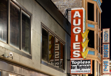 Augies and The Famous Brass Rail signs in downtown Minneapolis.