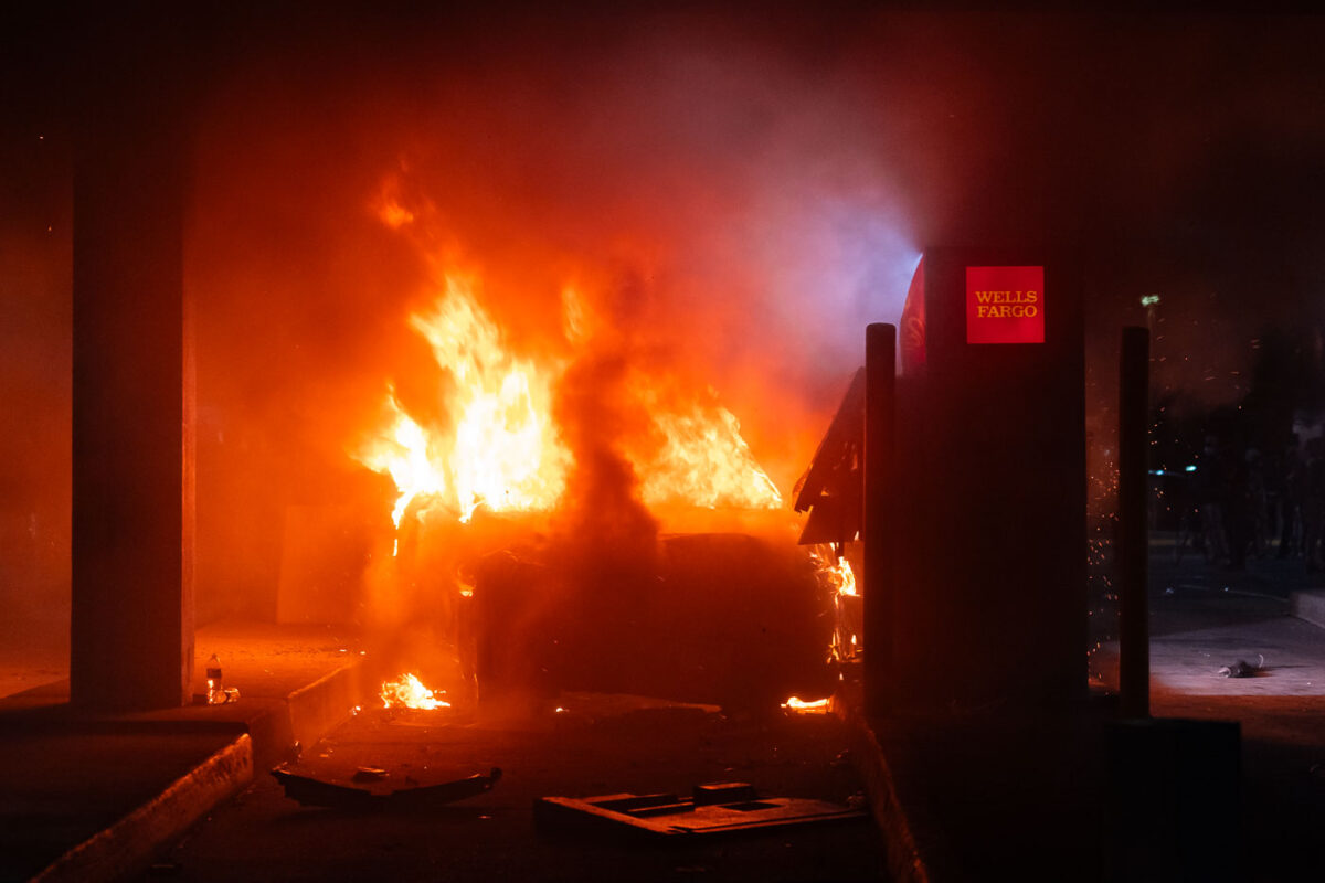 A car in the drive-thru lane at a Wells Fargo Bank on May 29, 2020. The bank is across the street from the Minneapolis Police 5th Precinct where protesters have gathered on the 4th day of protests in Minneapolis following the death of George Floyd.