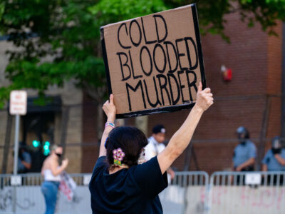 Minneapolis 3rd Precinct Protester with "Cold Blooded Murder" Sign
