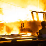 A 6-story new housing development on fire near the Minneapolis Police 3rd Precinct during the 2nd day of protests in Minneapolis following the death of George Floyd.