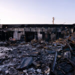 The left behind rubble of Atlas Staffing. The employment companies building was burned the previous month during riots over the death of George Floyd.