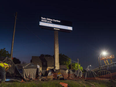 Minneapolis 2020: Curfew Billboard & Homeless Encampment