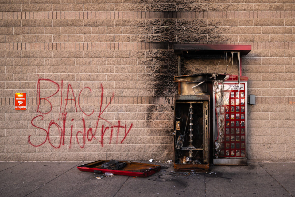 Burned out Red Box kiosk outside a Walgreens store. The store was burned weeks earlier during unrest in Minneapolis following the May 25th, 2020 death of George Floyd.