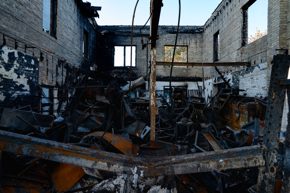 A burned building about a block away from the Minneapolis Police Third Precinct. The building was burned during unrest over the May 25th murder of George Floyd.