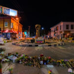 A circle of flowers around a raised fist at George Floyd Square on June 15, 2020. Floyd was killed by the Minneapolis Police the month prior.