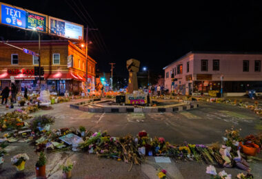 A circle of flowers around a raised fist at George Floyd Square on June 15, 2020. Floyd was killed by the Minneapolis Police the month prior.